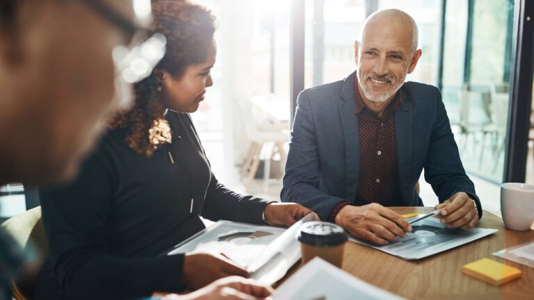 people sitting at conference table